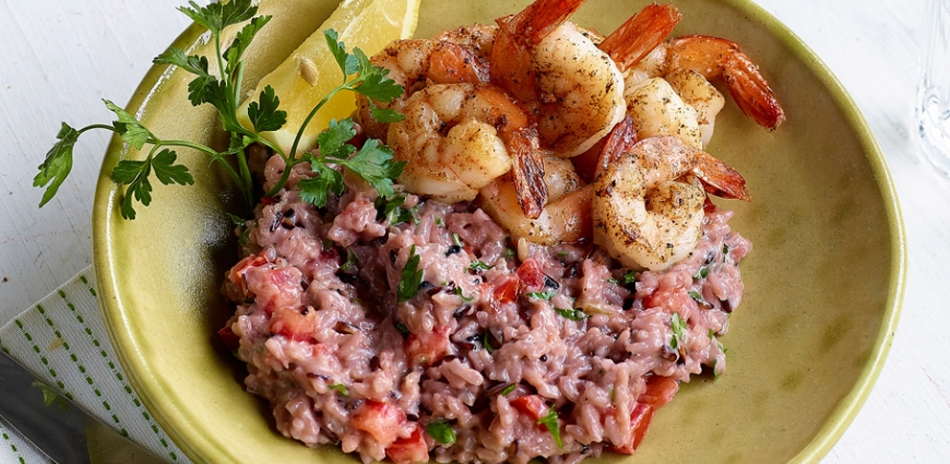 Risotto au riz violet, crème de coco et scampis