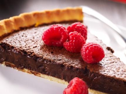 La tarte au chocolat et ses framboises