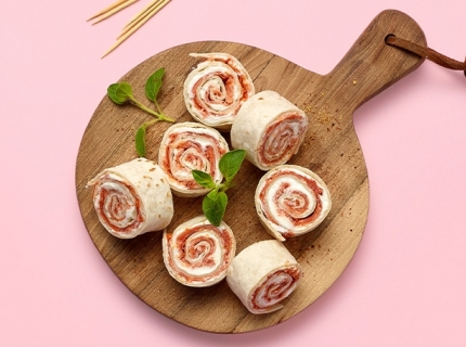 Rouleaux de spianata au fromage doux et à l’huile aromatisée d’ail